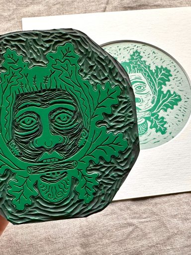 a Japanese vinyl block of a Green Man - inspired by the Green Man in Norwich Cathedral.